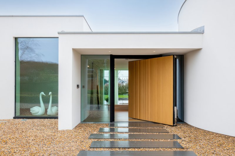 front entrance with pivot door